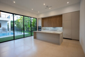 Handmade wooden kitchen cabinetry showcasing artisan craftsmanship and unique custom features designed for modern interiors.